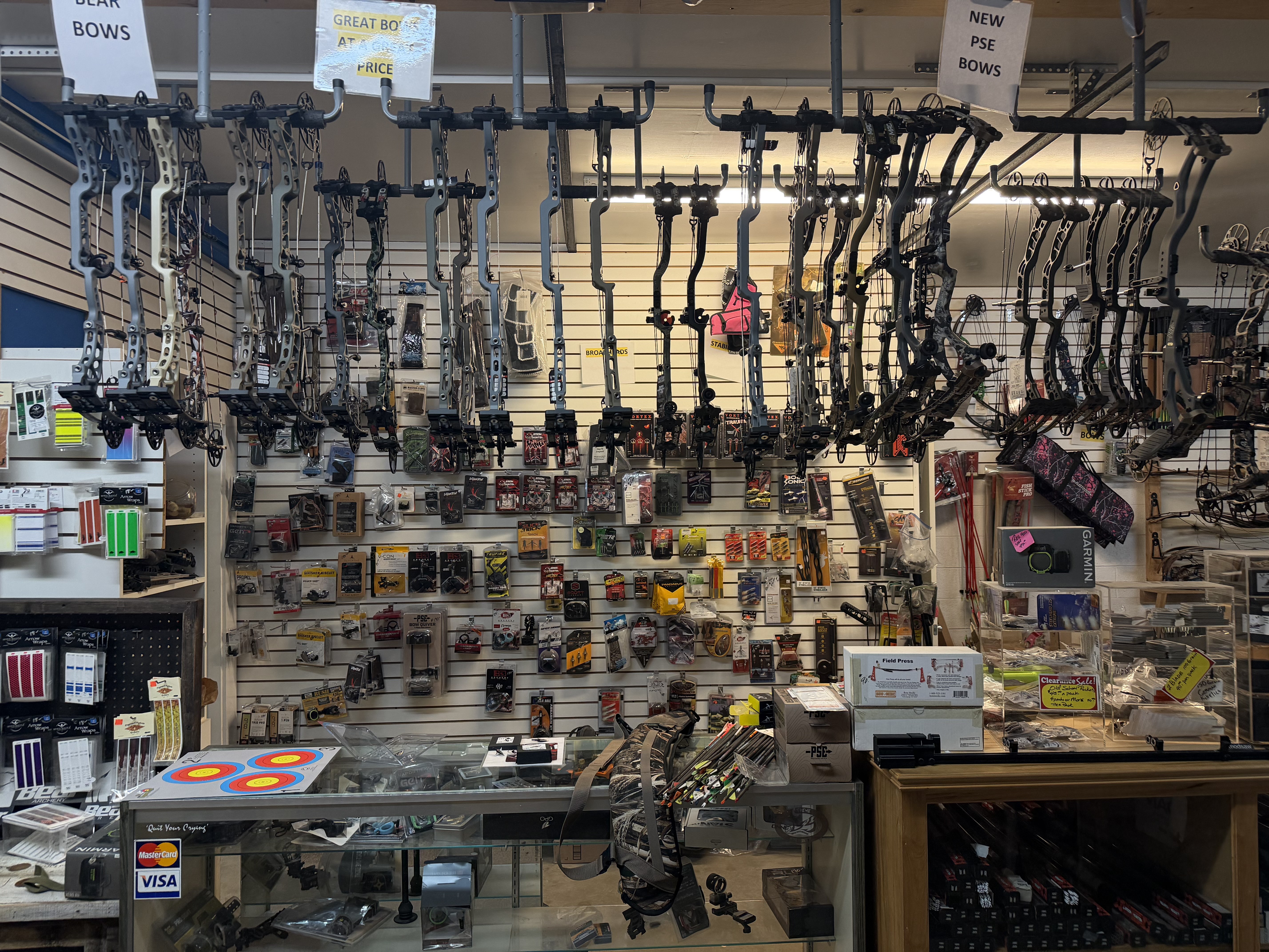 Wall of bows in the Stickflipper Archery shop